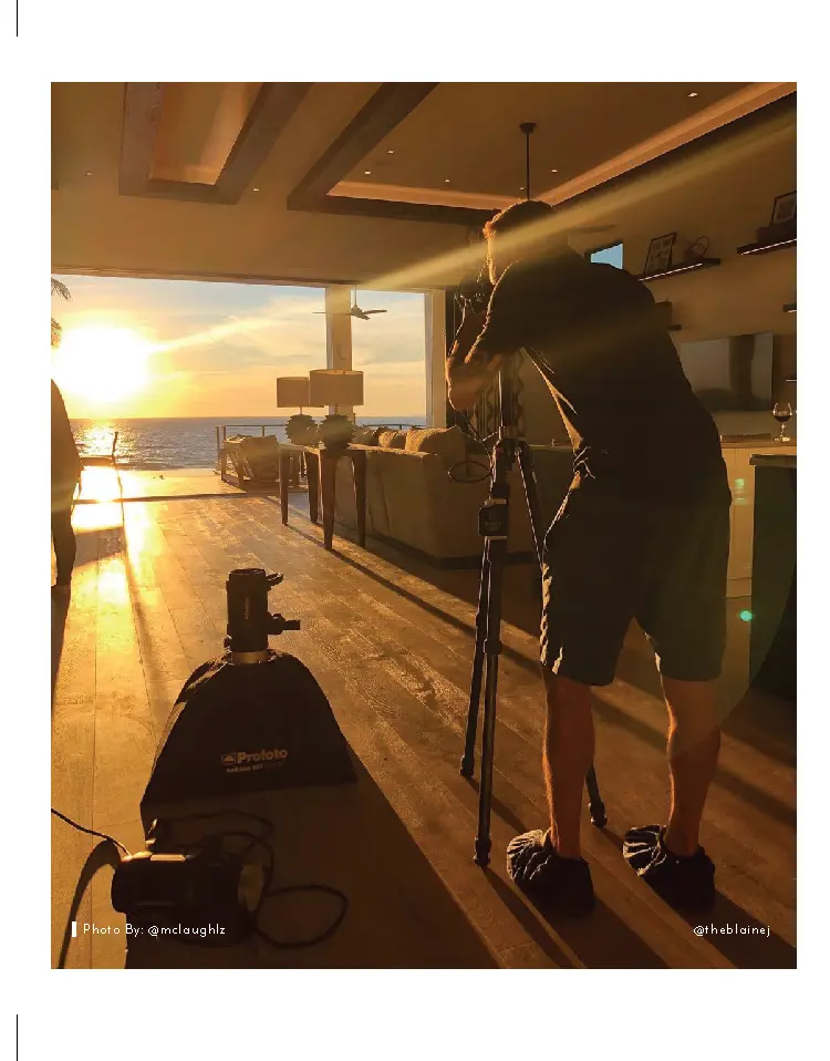 man taking a photograph of the ocean using the product